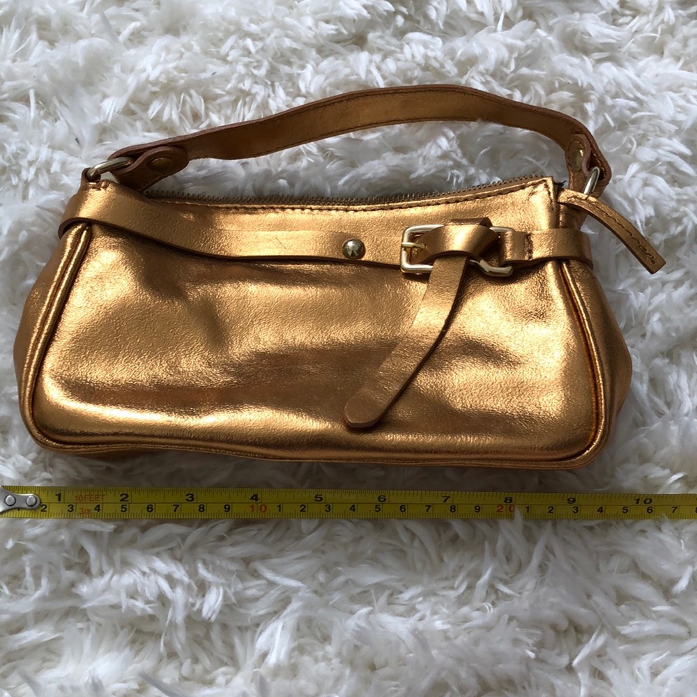 Laura Di Maggio golden leather bag